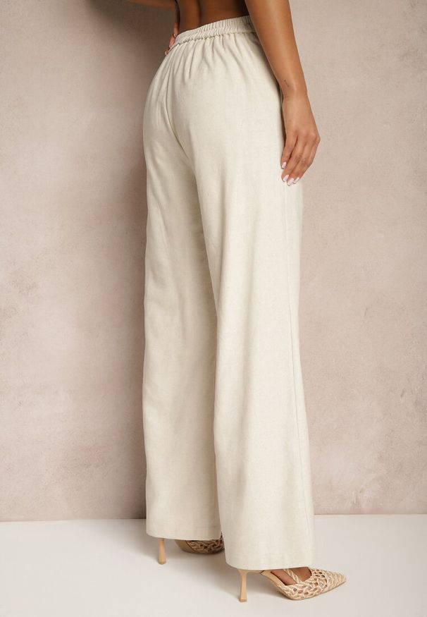 Renee - Beżowe Spodnie z Bawełną o Szerokim Kroju High Waist Feneliona. Okazja: na co dzień. Stan: podwyższony. Kolor: beżowy. Materiał: bawełna. Styl: casual