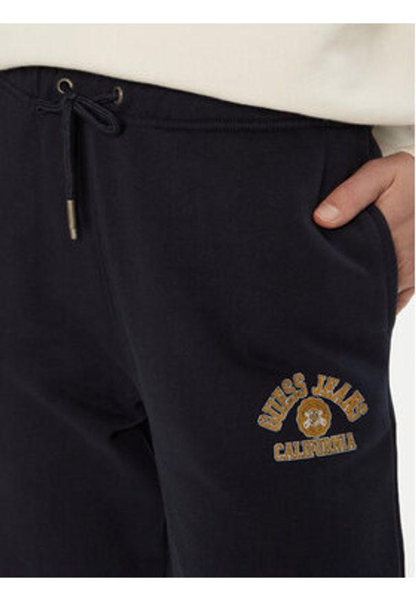 Guess Jeans Spodnie dresowe W5RB63 K68I4 Czarny Regular Fit. Kolor: czarny. Materiał: bawełna