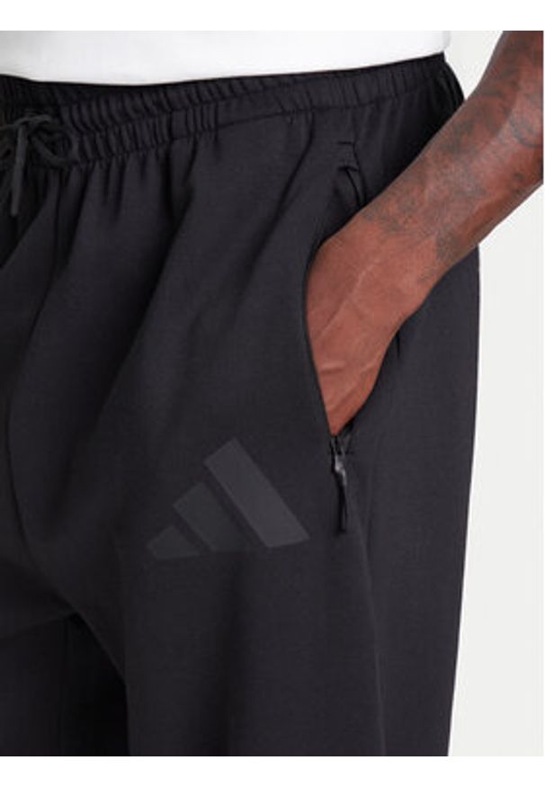 Adidas - adidas Spodnie dresowe Z.N.E. JC5478 Czarny Loose Fit. Kolor: czarny. Materiał: bawełna
