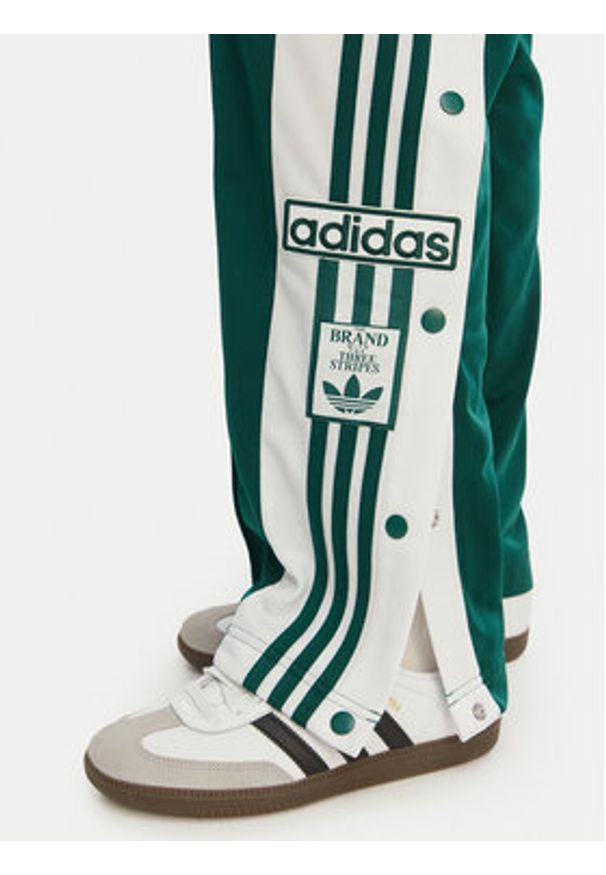 Adidas - adidas Spodnie dresowe Adibreak KD6327 Zielony Loose Fit. Kolor: zielony. Materiał: syntetyk