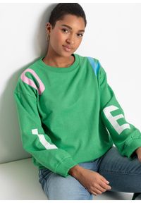 bonprix - Bluza oversize z miękkiej mieszanki z bawełną. Kolor: zielony. Materiał: bawełna. Wzór: nadruk, napisy #1