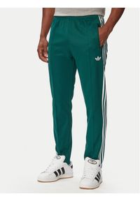 Adidas - adidas Spodnie dresowe Beckenbauer KE1668 Zielony ciemny Regular Fit. Kolor: zielony. Materiał: bawełna #1