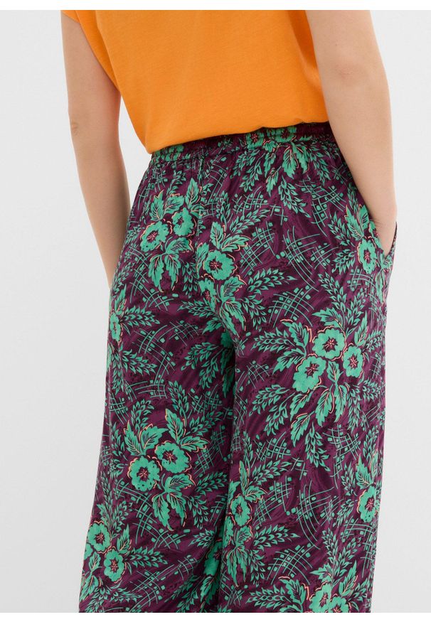 bonprix - Spodnie palazzo z lejącej wiskozy. Kolor: fioletowy. Materiał: wiskoza, materiał. Wzór: nadruk