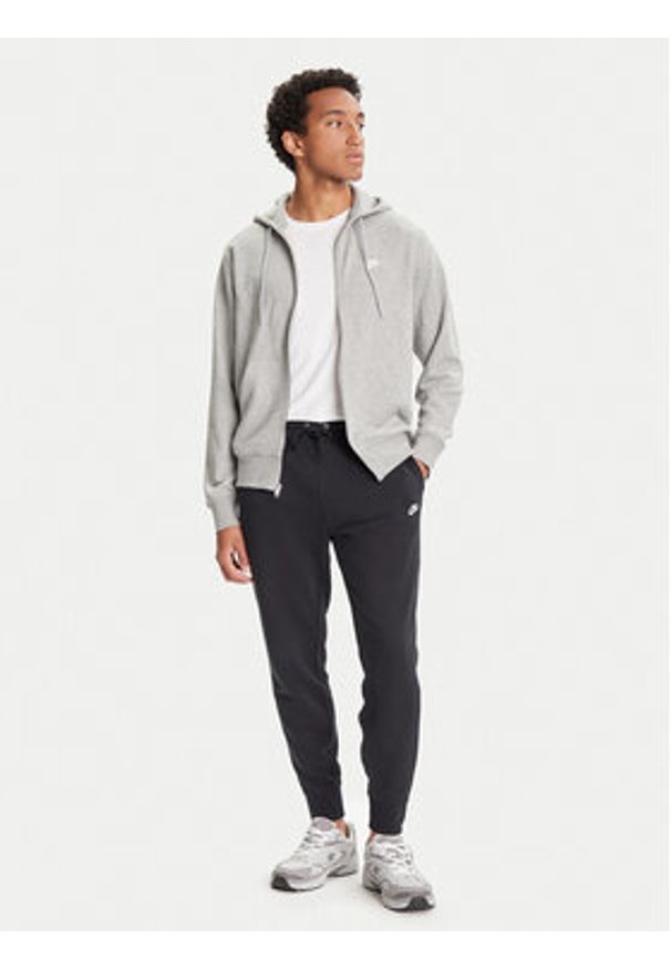 Nike Spodnie dresowe Club Fleece FN3801 Czarny Regular Fit. Kolor: czarny. Materiał: bawełna