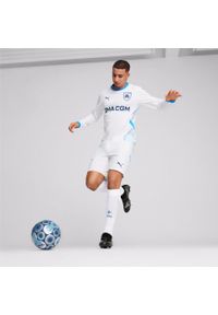 Puma - Koszulka domowa z długim rękawem OM 2024/25. Kolor: niebieski, biały, wielokolorowy. Długość rękawa: długi rękaw. Długość: długie. Sport: piłka nożna