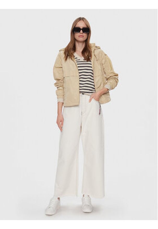 TOMMY HILFIGER - Tommy Hilfiger Wiatrówka Transitional WW0WW41790 Beżowy Regular Fit. Kolor: beżowy. Materiał: syntetyk