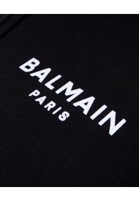 Balmain - BALMAIN - Krótka bluza z kapturem. Typ kołnierza: kaptur. Kolor: czarny. Materiał: bawełna. Długość rękawa: długi rękaw. Długość: krótkie. Wzór: nadruk, aplikacja