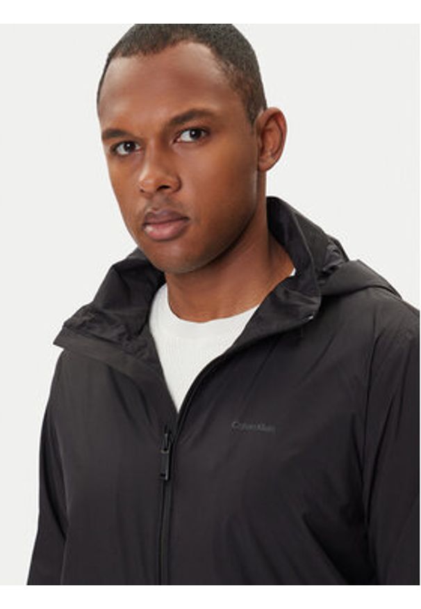Calvin Klein Kurtka przejściowa LV04LC511G Czarny Relaxed Fit. Kolor: czarny. Materiał: syntetyk