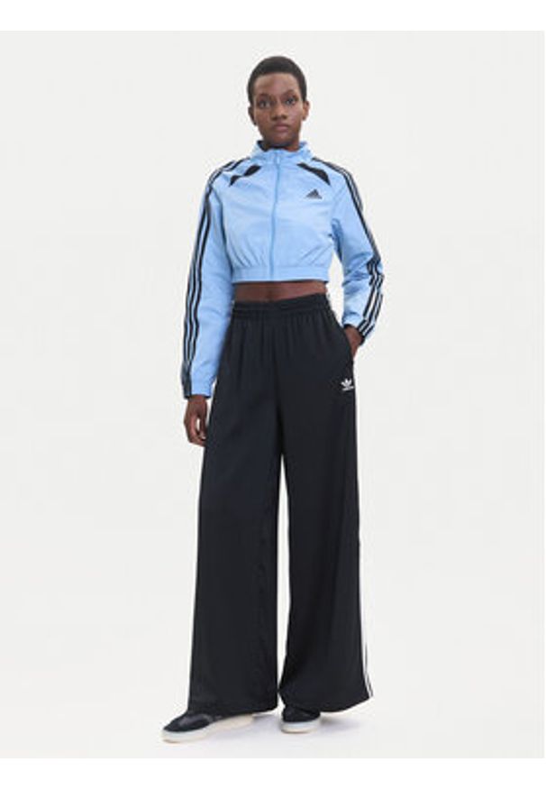Adidas - adidas Bluza Teamgeist adicolor JZ8277 Błękitny Slim Fit. Kolor: niebieski. Materiał: syntetyk