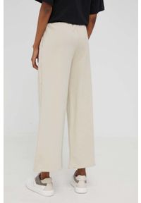 Answear Lab spodnie damskie kolor beżowy gładkie. Kolor: beżowy. Materiał: dzianina. Wzór: gładki #4