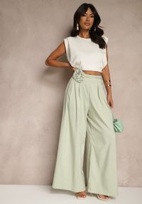 Renee - Zielone Spodnie o Szerokim Kroju High Waist z Kwiatem 3D Firalisse. Okazja: na co dzień. Stan: podwyższony. Kolor: zielony. Wzór: kwiaty. Styl: klasyczny, elegancki, casual