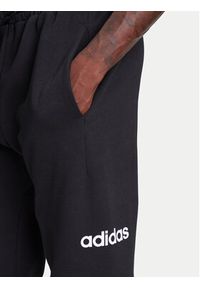 Adidas - adidas Spodnie dresowe Essentials Linear Fleece JN1786 Czarny Regular Fit. Kolor: czarny. Materiał: bawełna #4