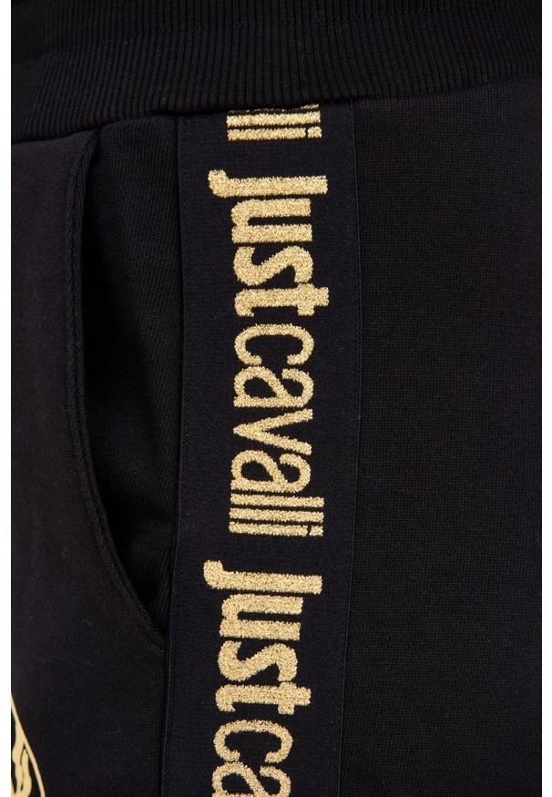 Just Cavalli - JUST CAVALLI Czarne spodnie dresowe T-round Gold. Kolor: czarny. Materiał: dresówka