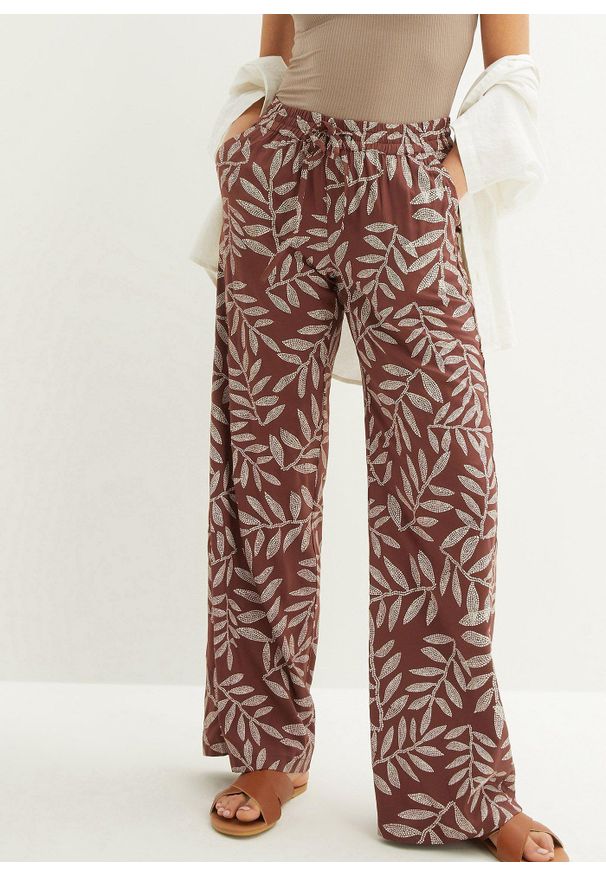 bonprix - Spodnie palazzo z nadrukiem. Kolor: brązowy. Wzór: nadruk. Styl: elegancki
