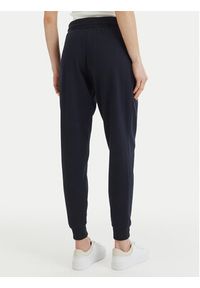 TOMMY HILFIGER - Tommy Hilfiger Spodnie dresowe UW0UW04522 Granatowy Regular Fit. Kolor: niebieski. Materiał: syntetyk, bawełna #5