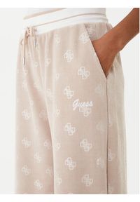 Guess Spodnie dresowe V5BB00 K1902 Brązowy Wide Leg. Kolor: brązowy. Materiał: syntetyk
