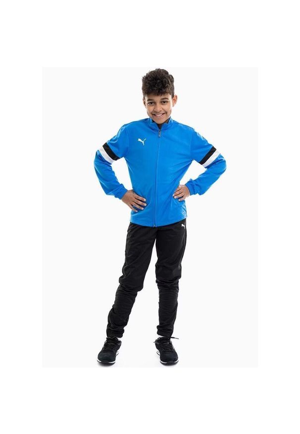 Dres treningowy chłopięcy Puma 65865502. Okazja: na uczelnię. Kolor: niebieski, wielokolorowy. Materiał: dresówka. Styl: sportowy