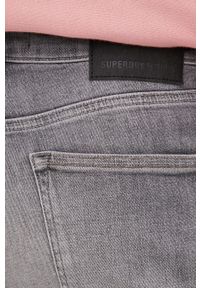 Superdry jeansy męskie. Kolor: szary
