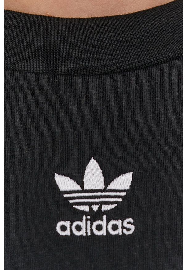 adidas Originals Spodnie damskie kolor czarny gładkie. Kolor: czarny. Materiał: dzianina. Wzór: gładki