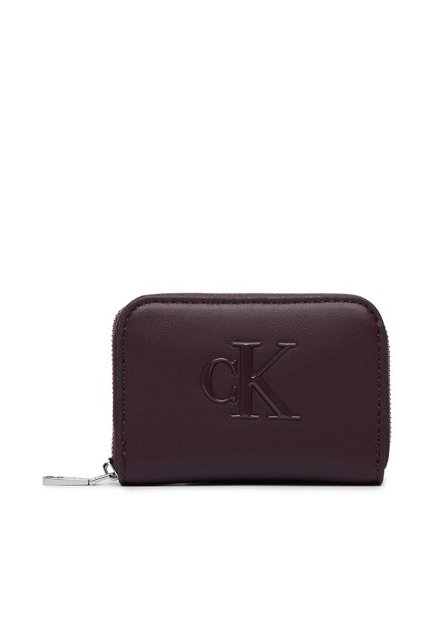 Calvin Klein Portfel Bold Ck Medium Zip Around LV04F1154G Bordowy. Kolor: czerwony. Materiał: skóra
