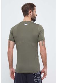 Under Armour t-shirt treningowy kolor zielony gładki. Kolor: zielony. Materiał: skóra, materiał. Wzór: gładki #3