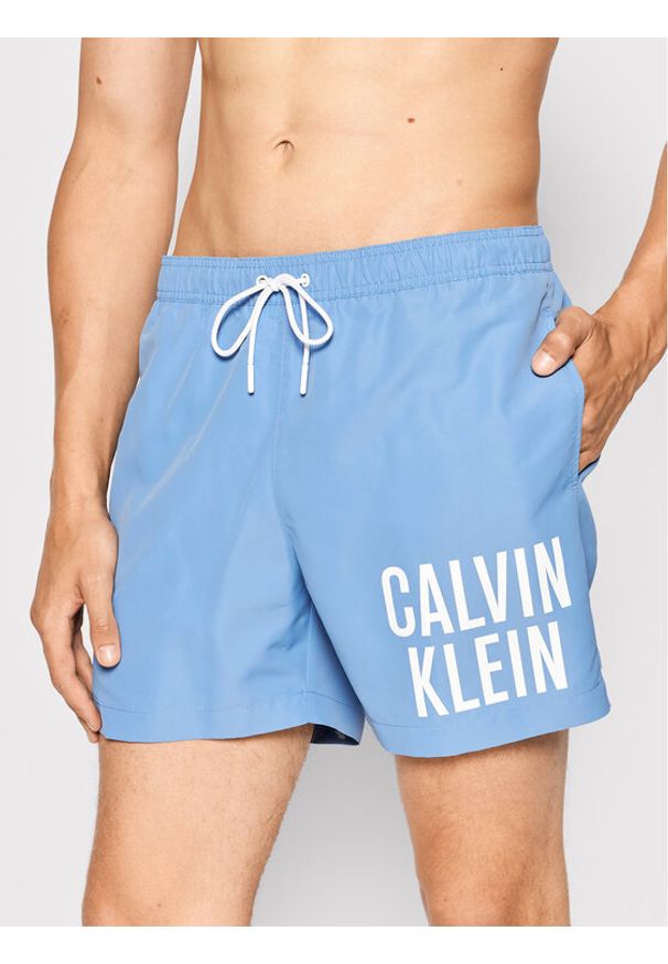 Calvin Klein Swimwear Szorty kąpielowe Medium Drawstring KM0KM00701 Błękitny Regular Fit. Kolor: niebieski. Materiał: syntetyk