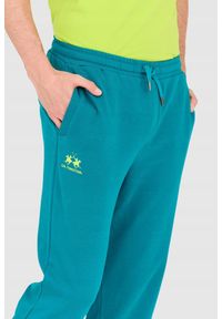La Martina - LA MARTINA Turkusowe męskie spodnie dresowe. Kolor: zielony. Materiał: bawełna