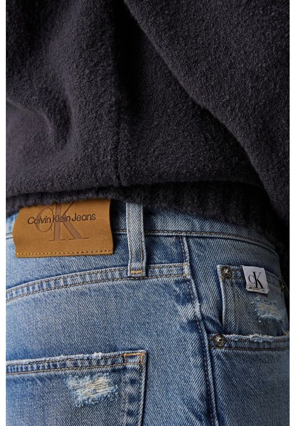 Calvin Klein - CALVIN KLEIN Błękitne męskie jeansy Dad Jean, Rozmiar 34. Okazja: na co dzień. Kolor: niebieski. Długość: długie. Styl: casual, elegancki