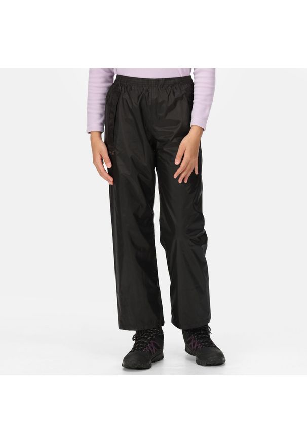 Stormbreak Regatta dziecięce turystyczne spodnie wodoodporne. Kolor: czarny. Materiał: poliester. Sezon: lato. Sport: turystyka piesza