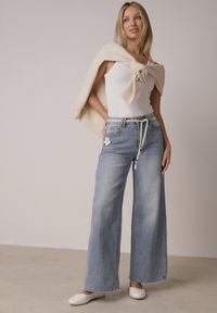 Born2be - Niebieskie Jeansy z Bawełną o Szerokim Kroju z Wysokim Stanem i Sznurkowym Paskiem Ianaia. Okazja: na co dzień. Stan: podwyższony. Kolor: niebieski. Styl: casual, klasyczny #1