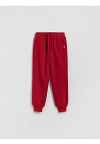 Reserved - Bawełniane spodnie jogger - czerwony. Kolor: czerwony. Materiał: bawełna