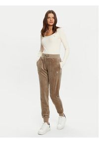 Guess Spodnie dresowe V3BB27 KBXI2 Brązowy Regular Fit. Kolor: brązowy. Materiał: syntetyk
