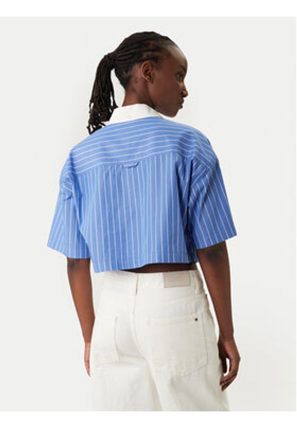 Tommy Jeans Polo DW0DW22596 Niebieski Relaxed Fit. Typ kołnierza: polo. Kolor: niebieski. Materiał: bawełna