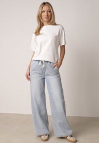 Born2be - Niebieskie Jeansy z Lyocellem i Bawełną o Szerokim Kroju z Wiązaniem Zolia. Okazja: na co dzień. Kolor: niebieski. Styl: casual #1