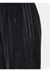 Adidas - adidas Spodnie dresowe Firebird Lace KD0351 Czarny Loose Fit. Kolor: czarny. Materiał: syntetyk, bawełna #5