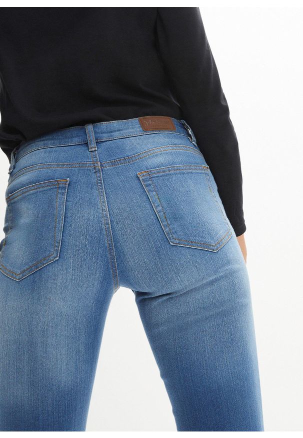bonprix - Dżinsy ze stretchem skinny, mid waist. Kolor: niebieski