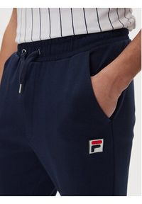 Fila Spodnie dresowe Lobbes FAM0922 Granatowy Tapered Fit. Kolor: niebieski. Materiał: syntetyk #5