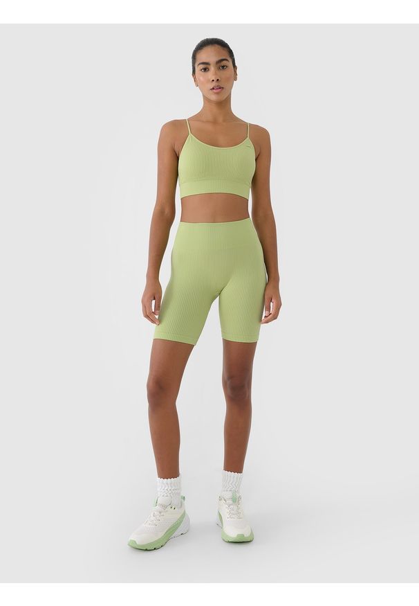 4f - 4F Legginsy kolarki bezszwowe treningowe damskie - zielone XS/S. Stan: podwyższony. Kolor: zielony. Materiał: elastan, włókno, dzianina, materiał, syntetyk. Długość: krótkie. Wzór: jednolity. Sport: fitness