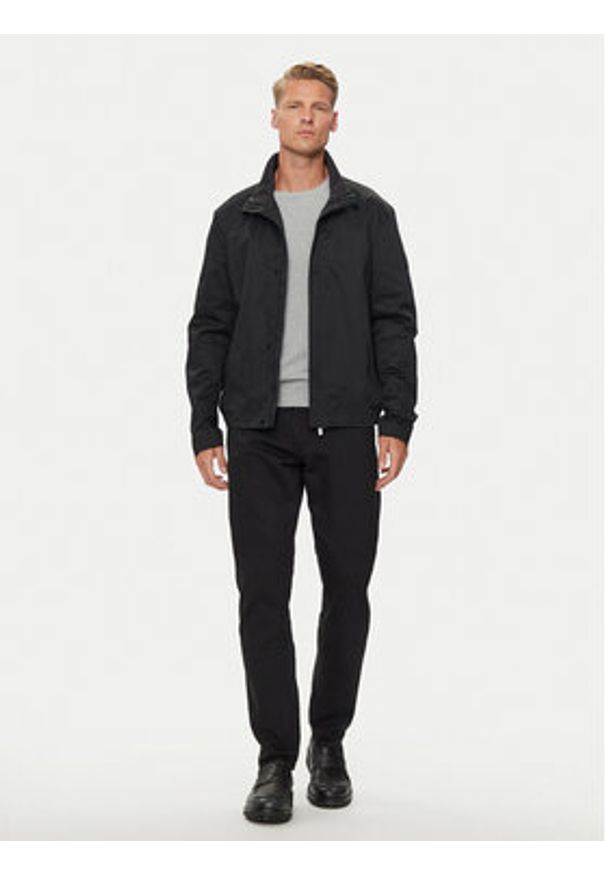 Calvin Klein Jeansy K10K112535 Czarny Tapered Fit. Kolor: czarny