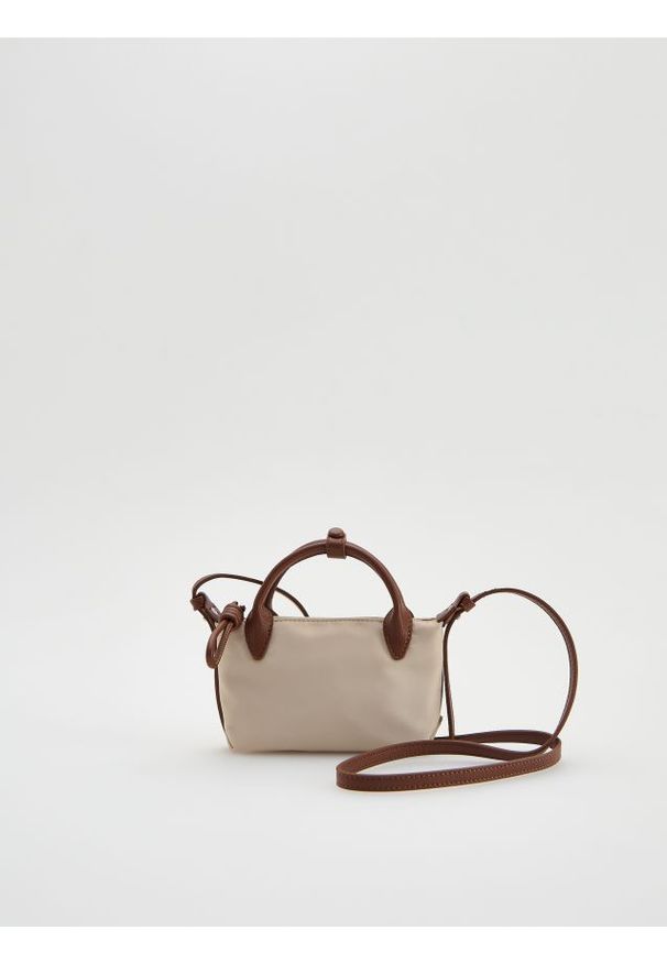 Reserved - Torebka crossbody - beżowy. Kolor: beżowy. Wzór: gładki