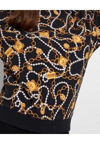 MOSCHINO - Czarna bluza we wzory. Kolor: czarny. Materiał: materiał, bawełna. Wzór: nadruk. Styl: klasyczny