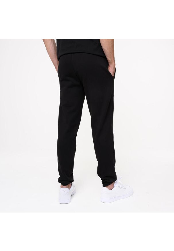 Spodnie dresowe męskie Puma Gym & Pilates. Materiał: dresówka. Sport: joga i pilates
