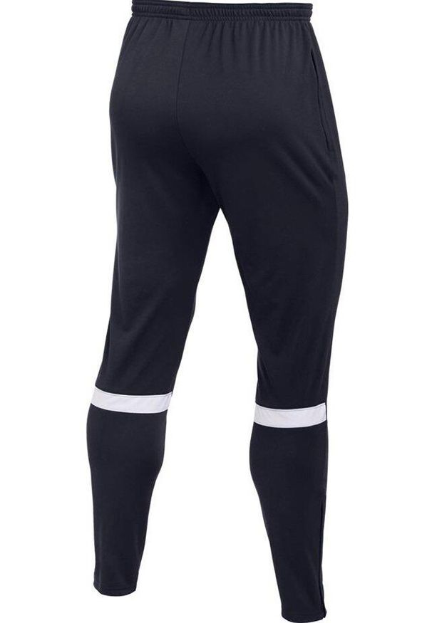 Spodnie dla dzieci Nike Dri-FIT Academy granatowe CW6124 451. Kolor: wielokolorowy. Technologia: Dri-Fit (Nike). Sport: piłka nożna