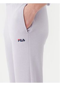 Fila Spodnie dresowe Lucerna FAW1055 Fioletowy Regular Fit. Kolor: fioletowy. Materiał: bawełna #5