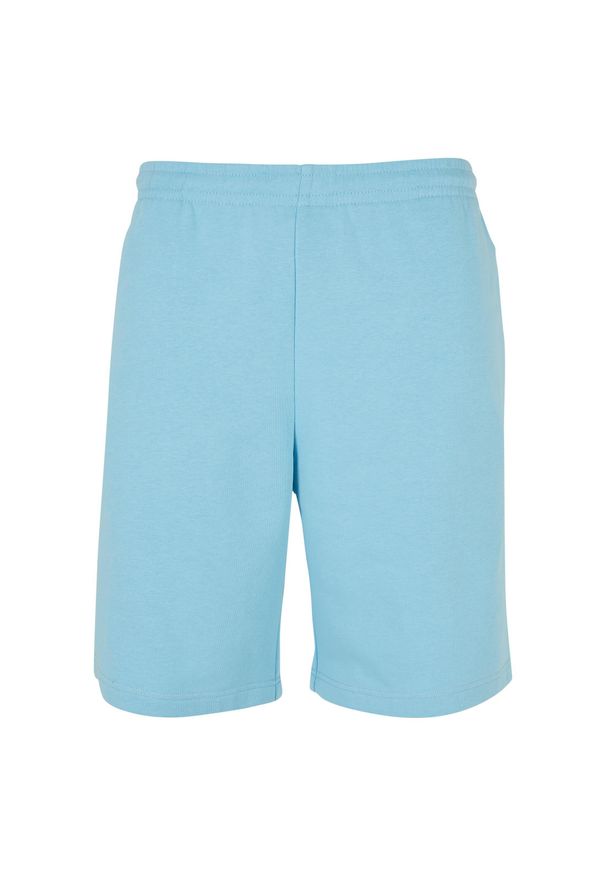 Szerokie spodenki dresowe z frotte Urban Classics. Kolor: niebieski. Materiał: dresówka. Długość: krótkie. Sezon: lato