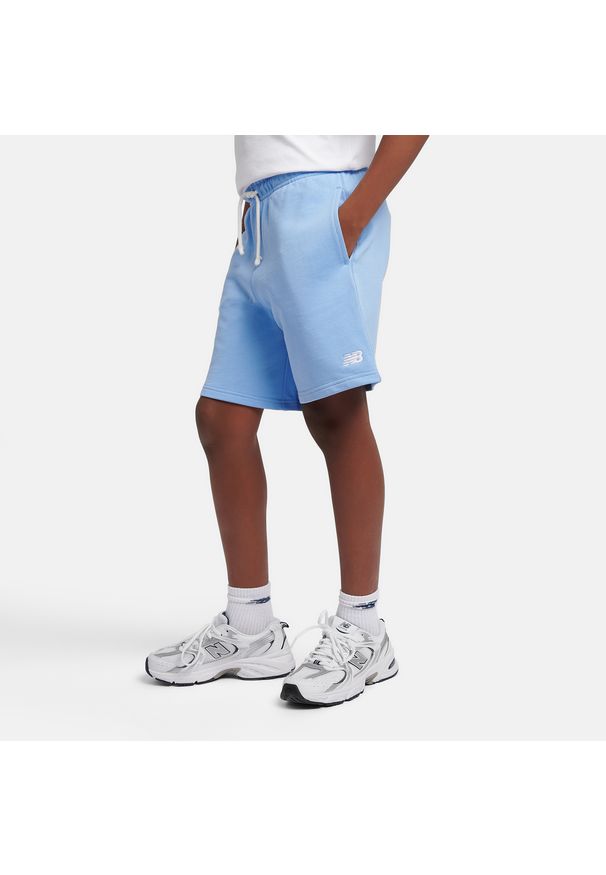 Spodenki dziecięce New Balance LAKB0008ELE – niebieskie. Kolor: niebieski. Materiał: bawełna. Styl: sportowy
