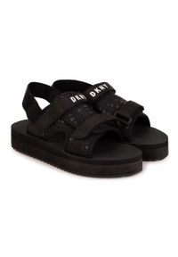 DKNY - Dkny sandały dziecięce kolor czarny. Zapięcie: rzepy. Kolor: czarny. Materiał: guma. Obcas: na platformie