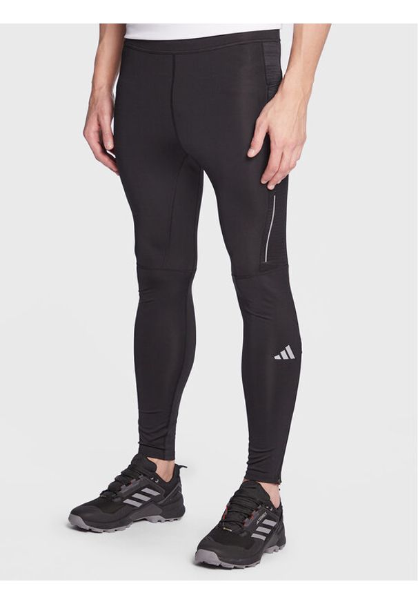 Adidas - adidas Legginsy Own the Run Leggings HM8444 Czarny Fitted Fit. Kolor: czarny. Materiał: syntetyk. Sport: bieganie