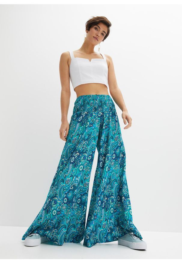 bonprix - Spodnie palazzo z lejącej wiskozy. Kolor: zielony. Materiał: wiskoza. Wzór: nadruk. Sezon: lato