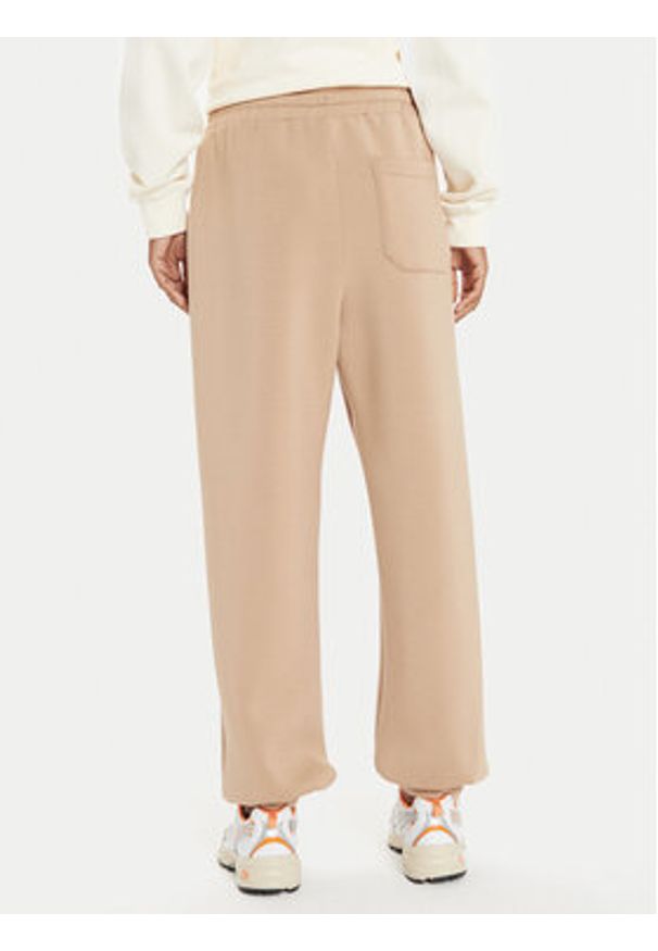 United Colors of Benetton - United Colors Of Benetton Spodnie dresowe 3PKLDF016 Beżowy Relaxed Fit. Kolor: beżowy. Materiał: wiskoza